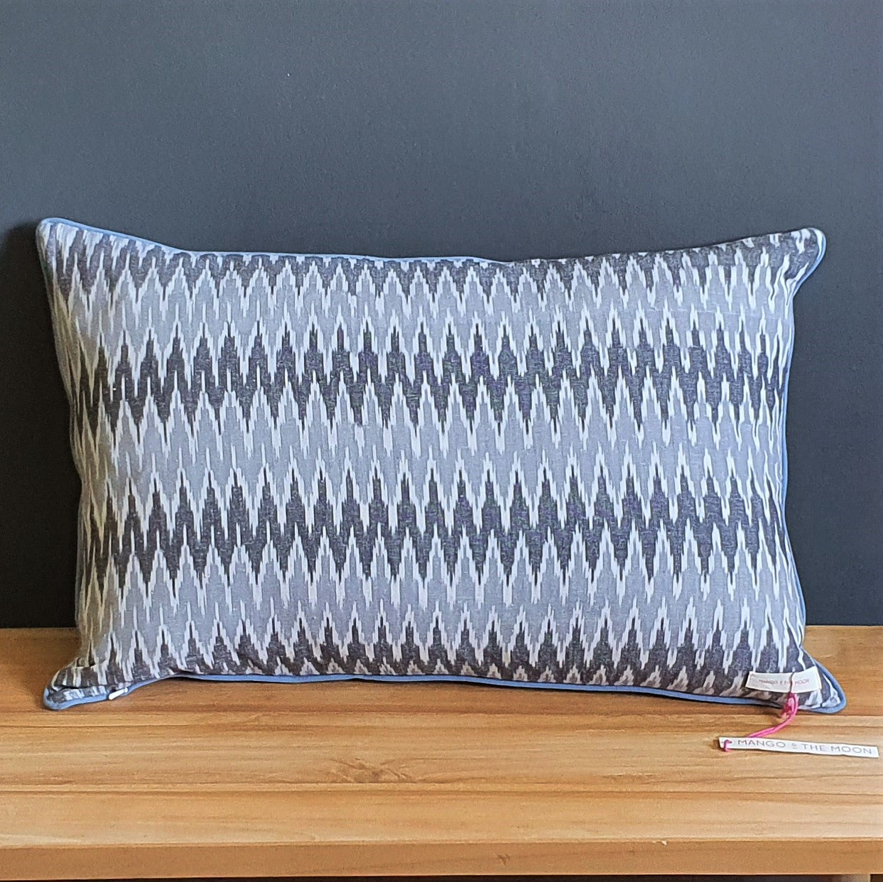 Damn The Weather! Large Rectangular Ikat Cushion with a Stormy Blue Piping.