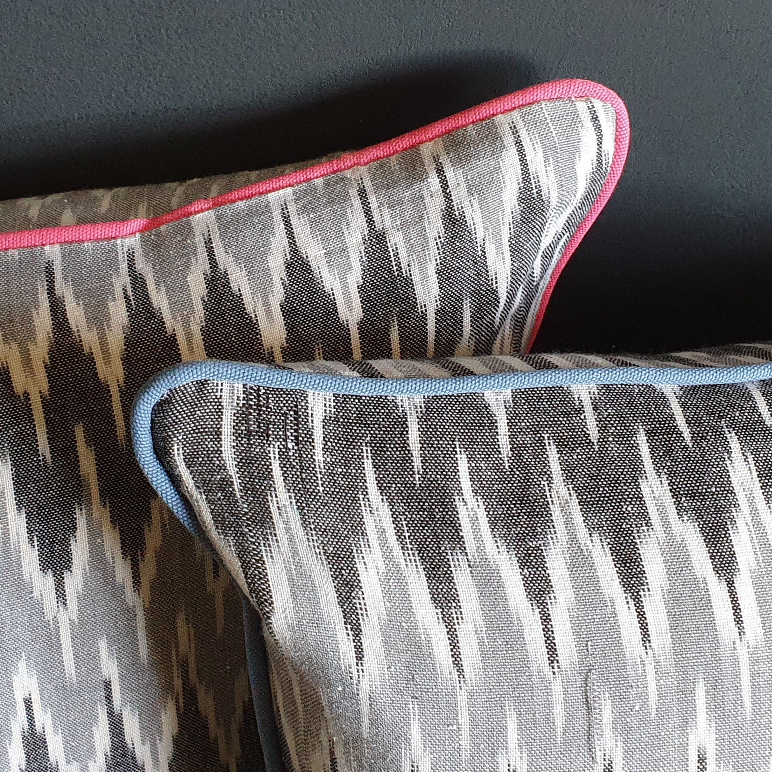 Damn The Weather! Large Rectangular Ikat Cushion with a Stormy Blue Piping.
