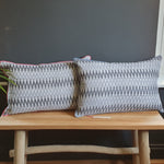 Load image into Gallery viewer, Damn The Weather! Large Rectangular Ikat Cushion with a Stormy Blue Piping.

