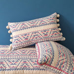 Load image into Gallery viewer, Neon Navajo Rectangular Cushion with Pom Poms.
