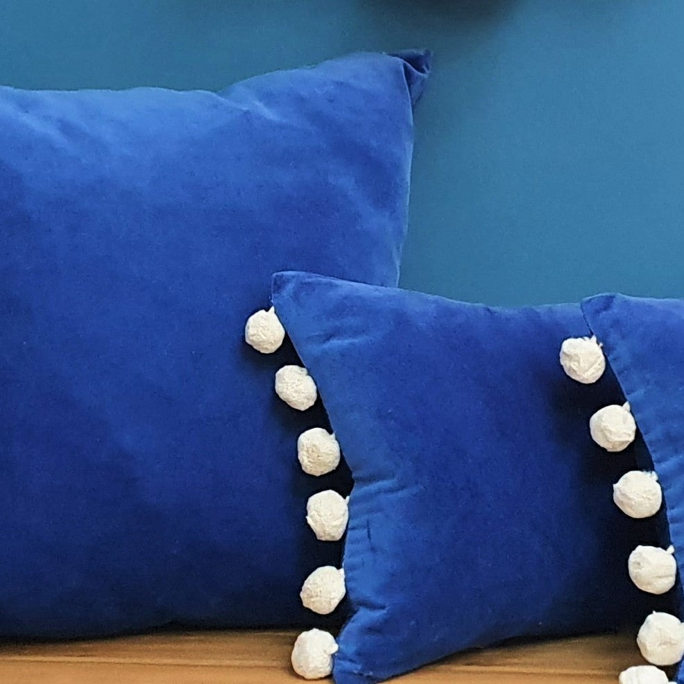 Tanzanite-Blue Velvet Rectangular Cushion with pom poms