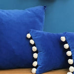 Load image into Gallery viewer, Tanzanite-Blue Velvet Rectangular Cushion with pom poms
