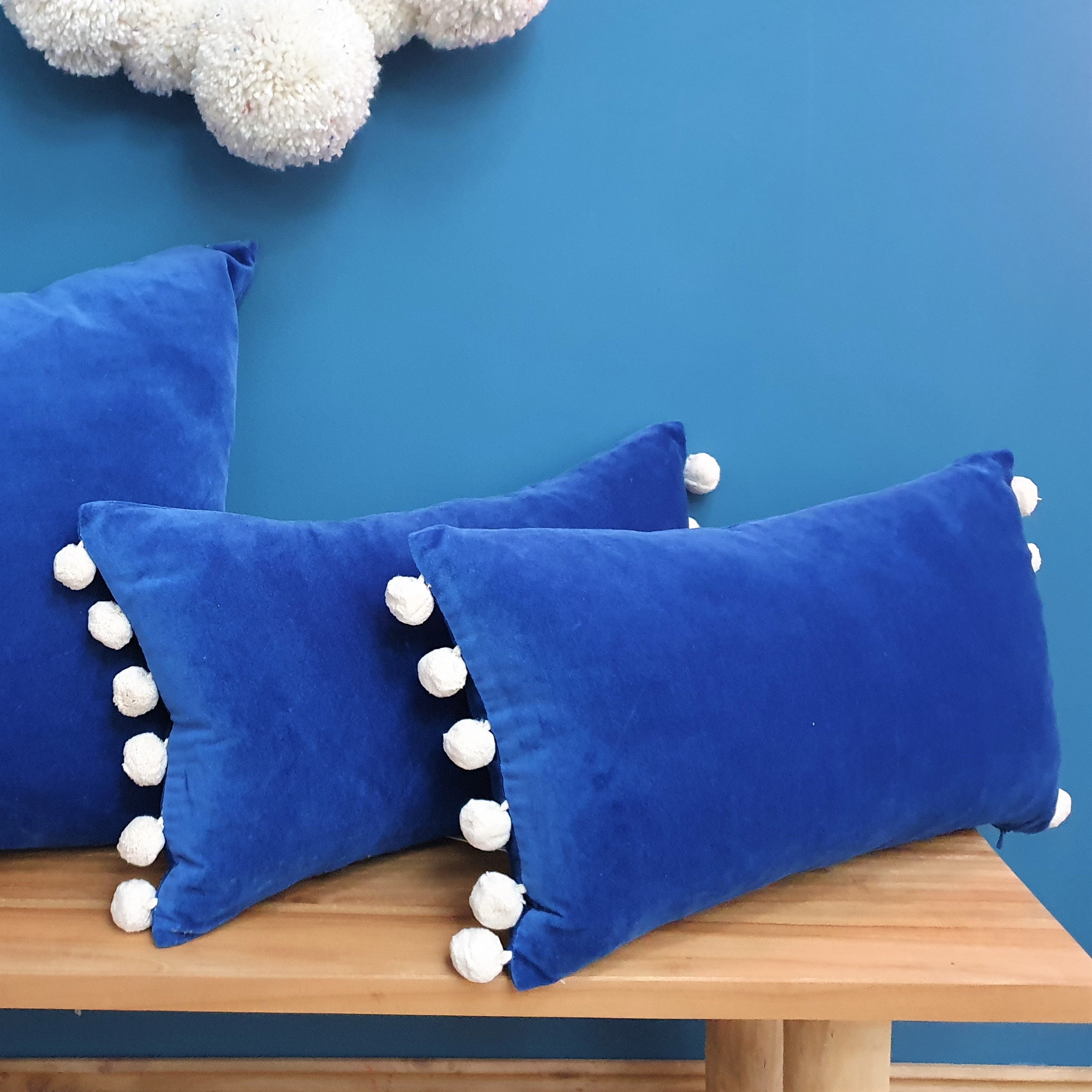 Tanzanite-Blue Velvet Rectangular Cushion with pom poms